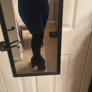 Black over the knee platform boots